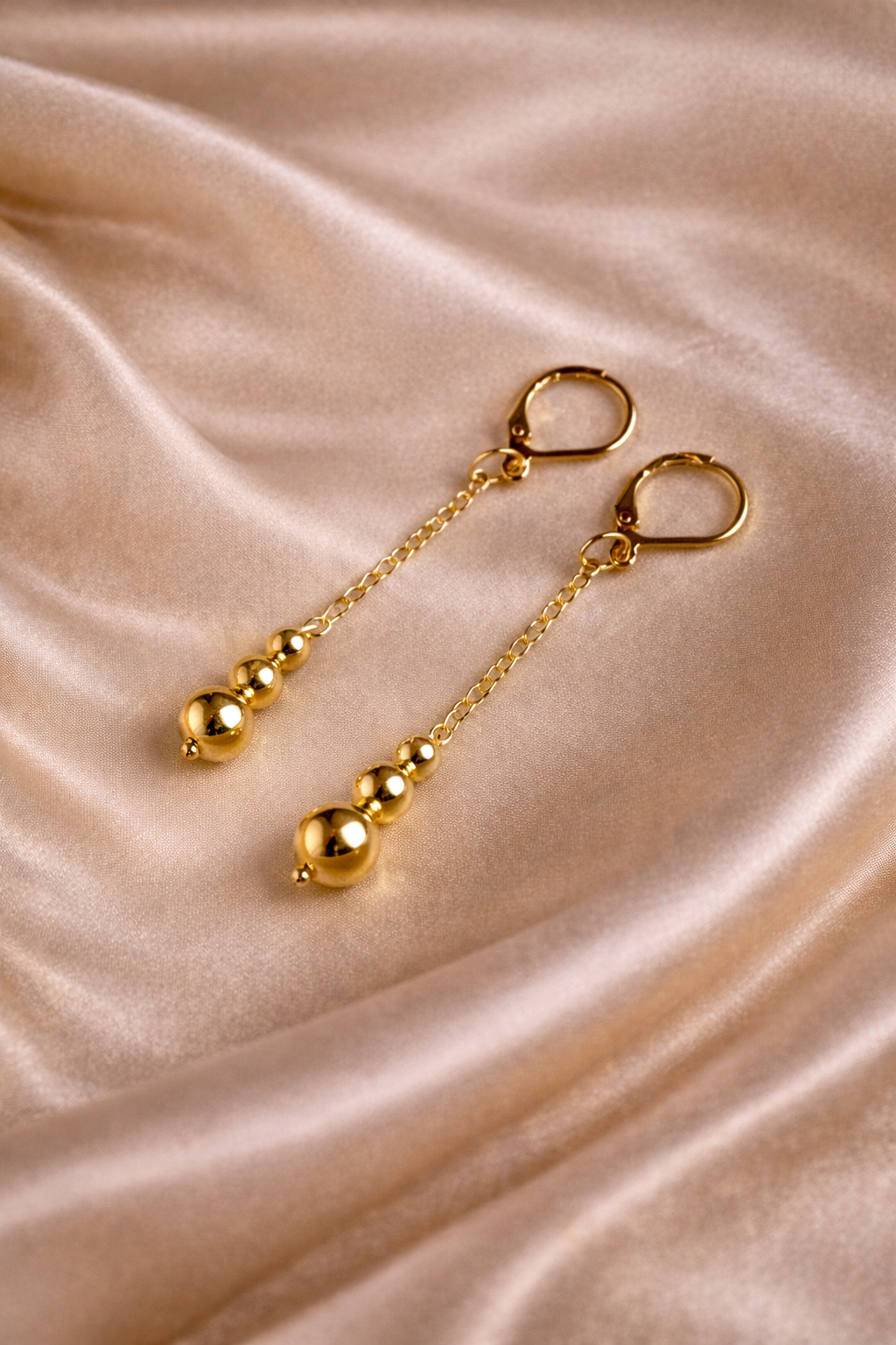 the Gold Sphere Drop Earrings